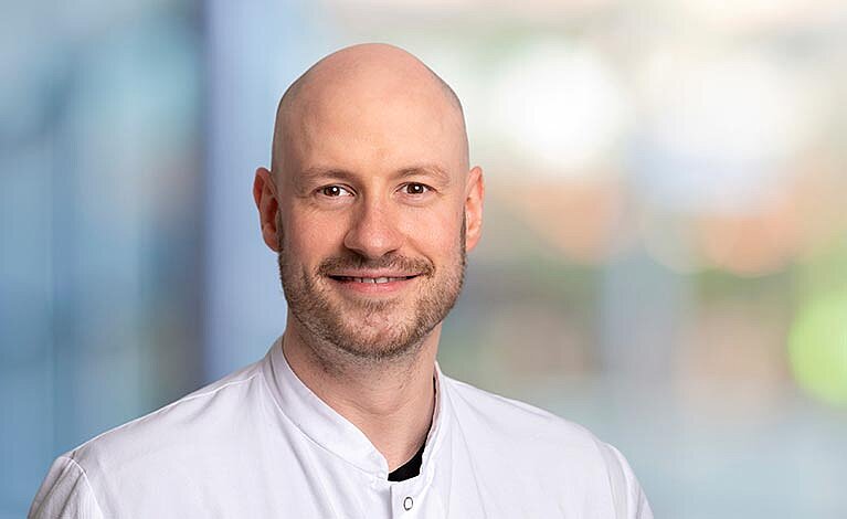 Portraitfoto von Dr. med. Sebastian Grathwohl