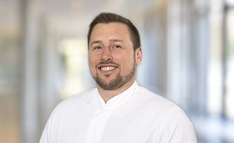 Portraitfoto von Dr. Sebastian Ankenbrand