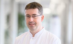 Portraitfoto von Prof. Dr. med Jürgen Kößler