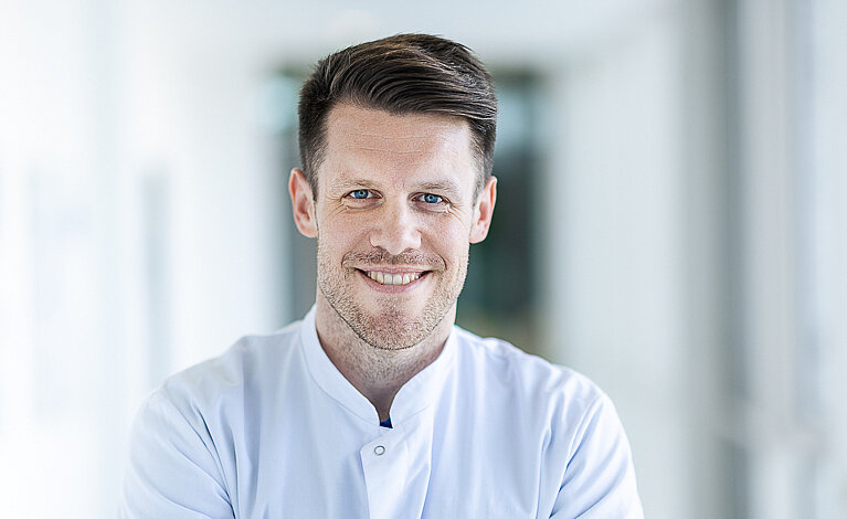 Portraitfoto von Jan-Peter Grunz